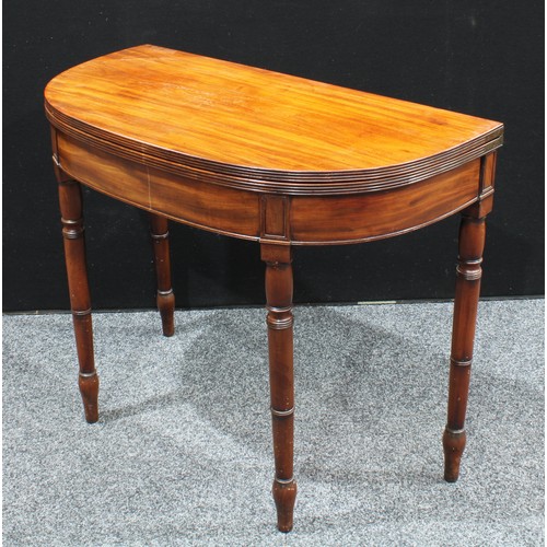 395 - *** Fine Art *** A George III mahogany demilune tea table, hinged top with reeded edge, above a deep... 