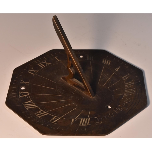 3067 - A dark patinated bronze octagonal sundial, inscribed Time Passes, pierced gnomon, 13cm diam