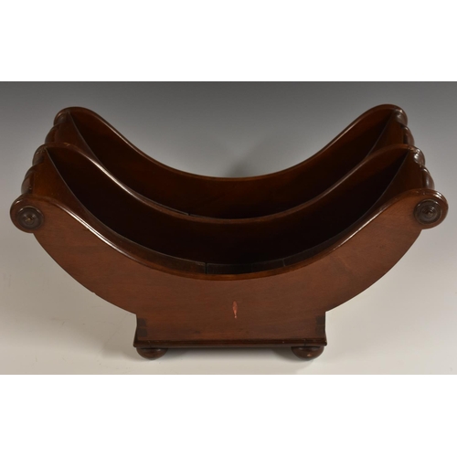 3071 - A George III mahogany boat shaped cheese coaster, shaped scroll ends applied with draught turned rou... 