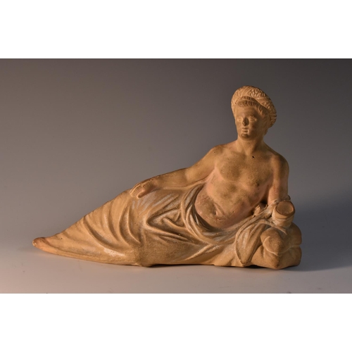 3078 - A Grand Tour terracotta figure, of the reclining Venus, 22.5cm wide