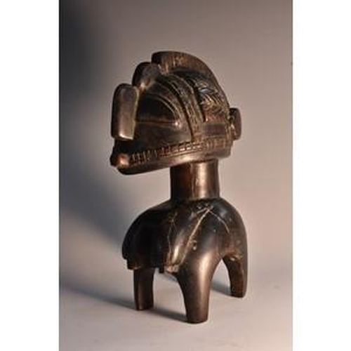 3516 - Tribal Art - an African carving, probably a heddle pulley, as a stylised female figure, 16cm high