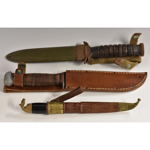 3554 - A World War II American M3 fighting knife, 17cm blade marked US M3-Utica, ring grip, 29.5cm long ove... 