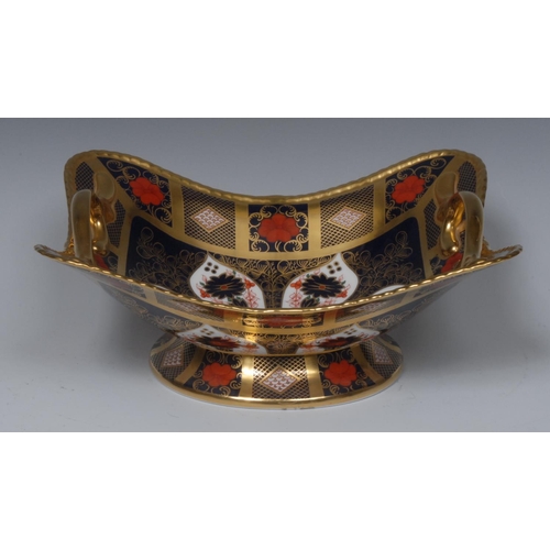 100 - A Royal Crown Derby 1128 pattern two handled basket, of shaped rectangular form, 29cm wide, printed ... 