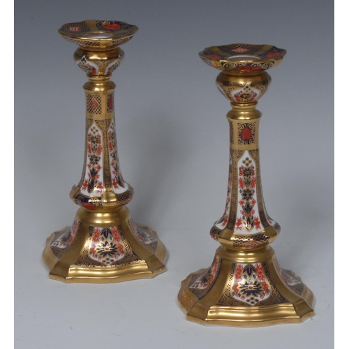 115 - A pair of Royal Crown Derby 1128 pattern miniature The Old Imari Miniature Candlesticks, 17cm high, ... 