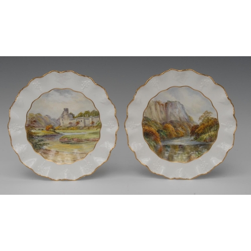 121 - A pair of Royal Crown Derby wavy edge plates, painted by W. E. J. Dean, signed,  well painted with a... 