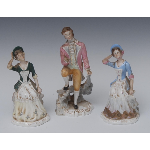 127 - A Royal Crown Derby figure, Beau Brummell, the dandy stands in 18th century dress, shaped base, 19cm... 