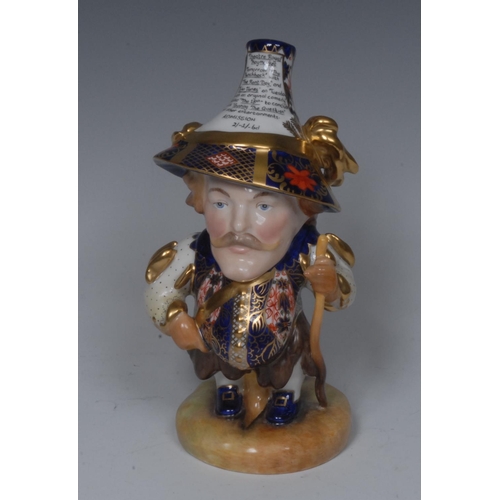 138 - A Royal Crown Derby Tall Mansion House Dwarf, he stands holding a stick, wearing an 1128 pointed hat... 