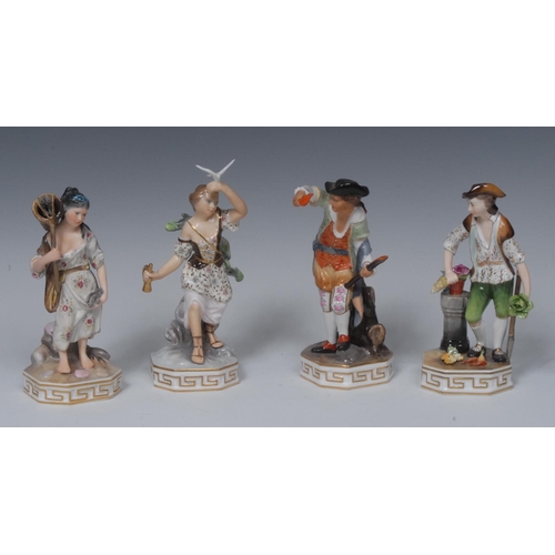 139 - A set of four Royal Crown Derby figures, The Elements, Water stands barefoot holding a fishing net i... 