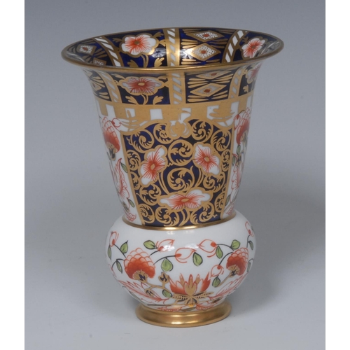 149 - A Royal Crown Derby 6299 pattern thistle shaped vase, everted rim, 11.75cm high, printed mark, date ... 