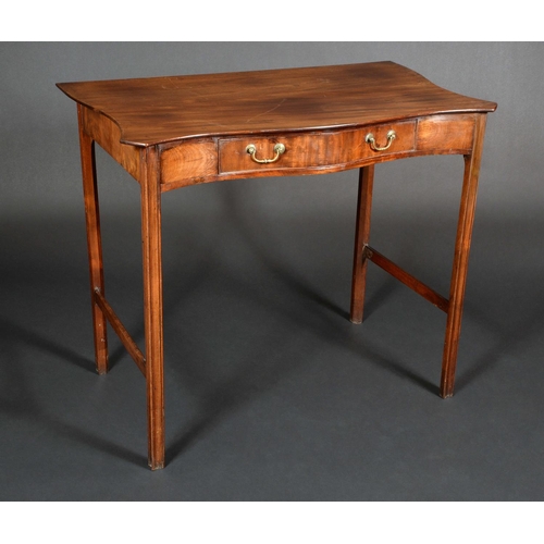 1565 - A George III mahogany serpentine side table, oversailing top above a frieze drawer, moulded and cham... 