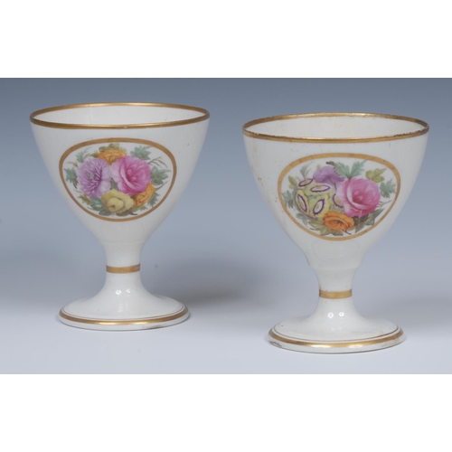 158 - A pair of Mansfield decorated goblets, painted with oval cartouches with colourful summer flowers, g... 