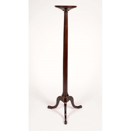 1582 - A George III Revival mahogany torchere, dished circular top, reeded column, cabriole legs, pad feet,... 