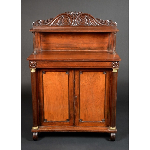 1592 - A George IV rosewood chiffonier, rectangular superstructure with shaped cresting carved with lotus s... 