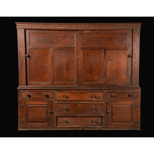 1598 - A large Victorian pine and oak housekeepers cupboard, moulded cornice  above a pair of sliding panel... 