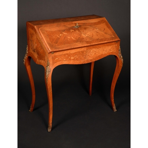 1606 - A Louis XV revival gilt metal mounted walnut and marquetry bureau de dame, fall front enclosing a we... 