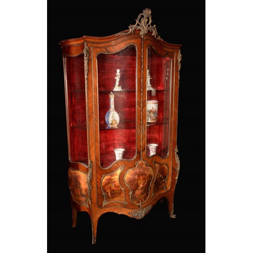 1607 - A Louis XV Revival ormolu-mounted mahogany and vernis Martin bombé-shaped vitrine, acanthus cresting... 