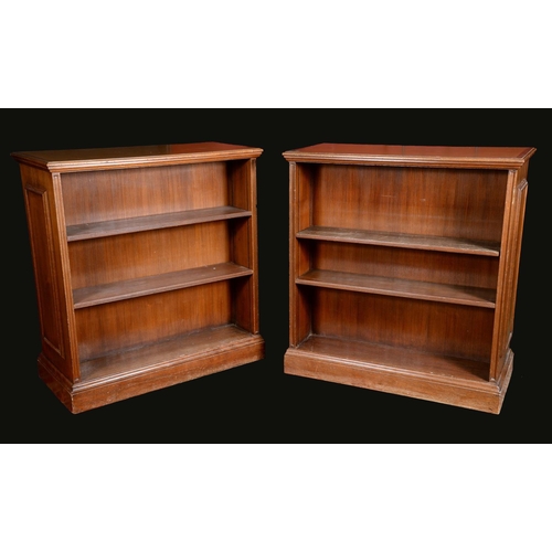 1615 - A pair of early 20th century oak room centre library bookcases, each oversailing moulded top with in... 