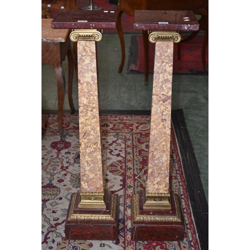 1617A - A pair of 19th century gilt metal mounted rouge and pale marble statuary pedestals, square plateaux,... 