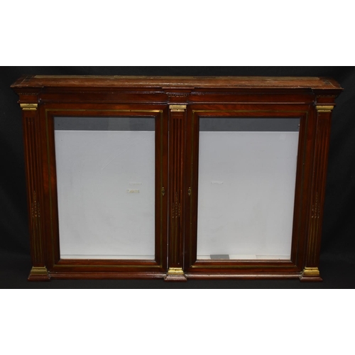 1619A - A late Victorian brass mounted mahogany wall hanging display cabinet, moulded outswept cornice above... 