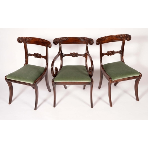 1632 - A set of eight post-Regency mahogany dining chairs, comprising six side chairs and a pair of carvers... 