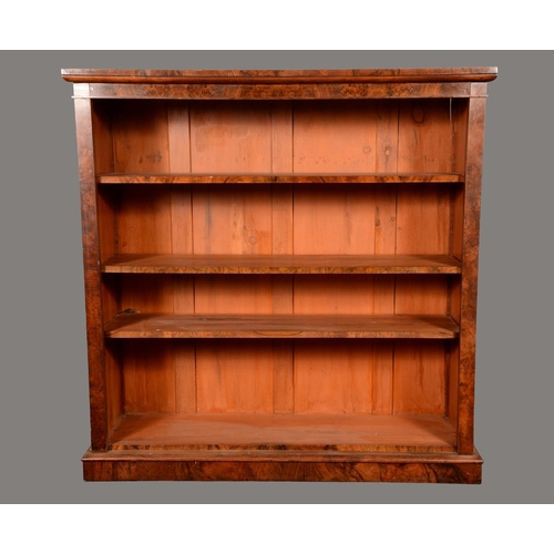 1641 - A Victorian burr walnut open library bookcase, rectangular top above three adjustable shelves, plint... 