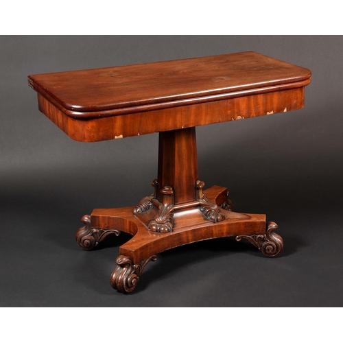 1650 - A Victorian mahogany rounded rectangular tea table, hinged top,spreading octagonal base, incurved re... 