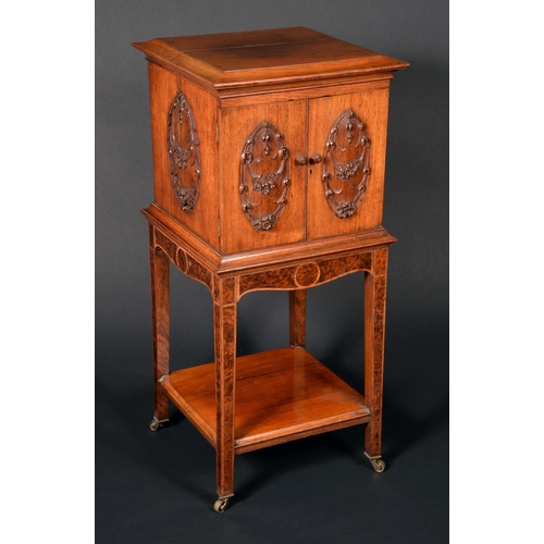 1657 - A Victorian walnut music room cabinet, moulded rectangular top above a pair of doors enclosing four ... 