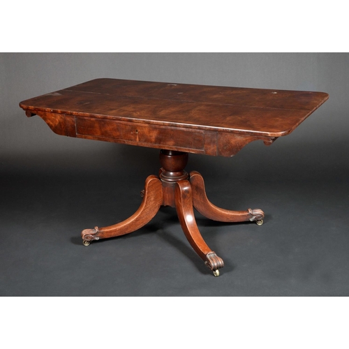 1666 - A William IV mahogany rounded rectangular library table, oversailing top above a deep frieze with si... 