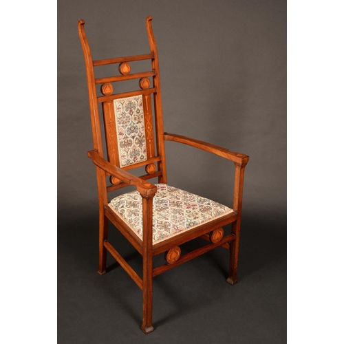 1678 - An Arts and Crafts mahogany and marquetry elbow chair, tall rectangular back with lofty scroll finia... 