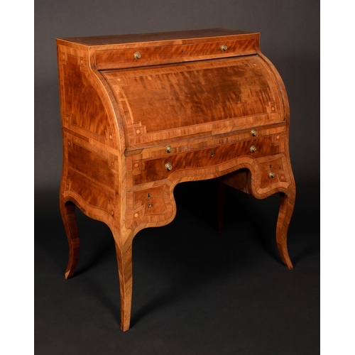 1681 - An early 19th century mahogany cylinder bureau, frieze drawer above a retractable front enclosing a ... 