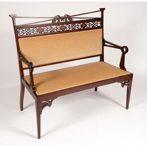 1688 - An Arts and Crafts mahogany and marquetry sofa, pierced cresting,  shaped arms, stuffed-over seat, t... 