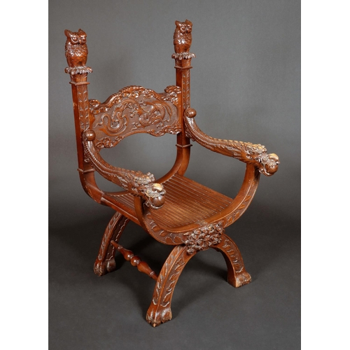 1735 - A Chinese X-frame throne chair, shaped rectangular back with lofty owl finials, carved in relief wit... 