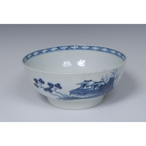 174 - A Worcester Precipice pattern punch bowl, painted in underglaze blue with huts, trees and foliage, t... 