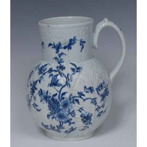 182 - A Worcester Cabbage Leaf Jug Floral pattern Dutch jug, decorated in underglaze blue with scrolling f... 