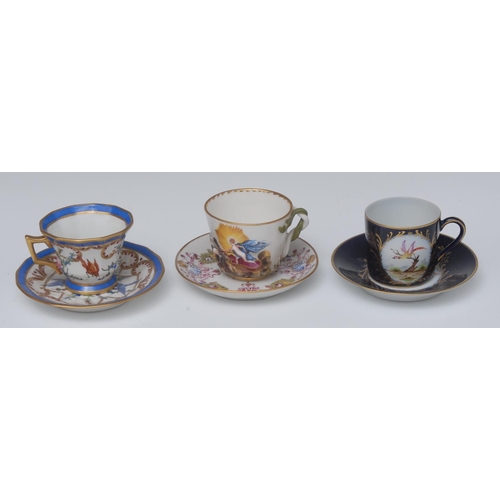 221 - A 19th century Capo-di-Monte cabinet cup and saucer, in relief wit classical figure in a chariot, ob... 