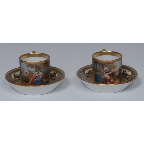 238 - A pair of 19th century Vienna coffee cans and saucers, decorated with Sabinerin and Calista, within ... 