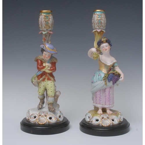 88 - A pair of Sampson Hancock Derby figural candlesticks, Allegorical of Winter and Autumn, Autumn stand... 