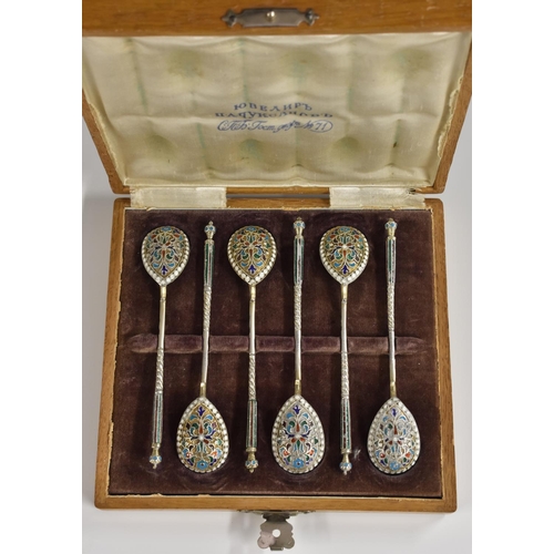 29 - A set of six Russian silver and cloisonne enamel coffee spoons, each decorated in polychrome with st... 