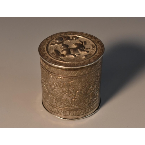 44 - A Chinese silver cylindrical bonbonniere, chased and engraved with animals in a landscape,sleeve-fit... 