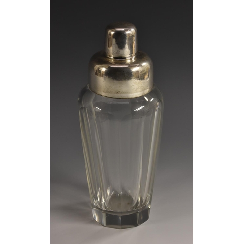 46 - A Continental Art Deco silver mounted clear glass cocktail shaker, push-fitting straining cover with... 