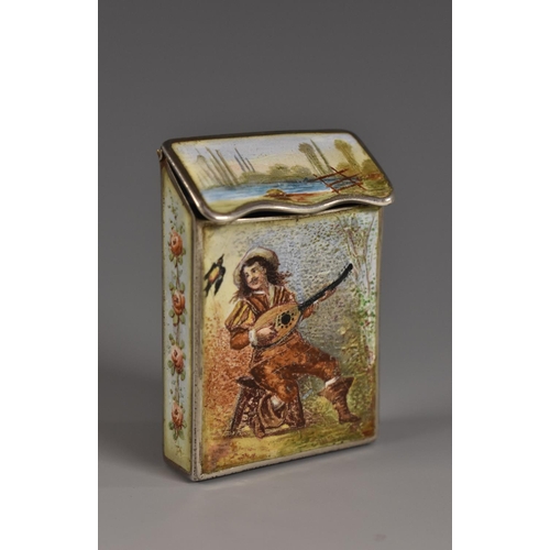 47 - A Continental silver and enamel vesta case, decorated in polychrome with serenading sweethearts, hin... 