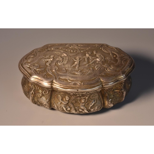 53 - A Continental silver shaped serpentine snuff box, chased with putti frolicking in an Arcadian landsc... 