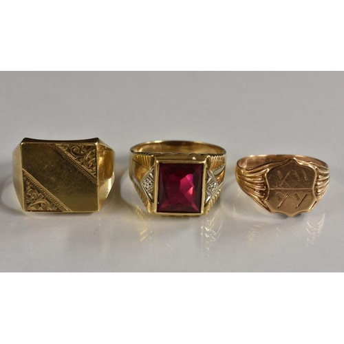 3170 - A gentleman's 9ct gold engraved platform signet ring, Birmingham 1966;  a 9ct rose gold signet ring,... 