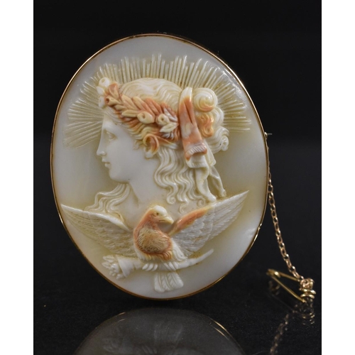 3172 - A 15ct gold mounted cameo brooch, Hebe the Greek goddess of youth and divine cupbearer to the gods a... 