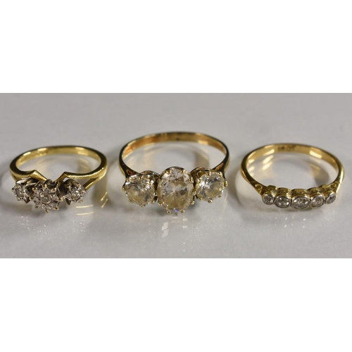 3181 - Rings - a diamond line ring, inset with five graduating round and irregular cut diamonds, total esti... 