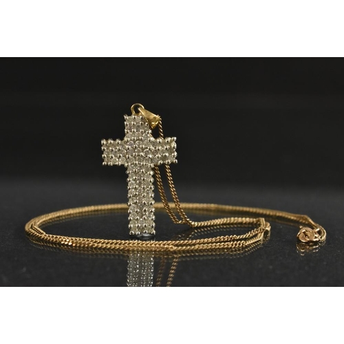 3197 - A pave diamond cross pendant necklace, encrusted with sixty two round cut diamonds, total estimated ... 