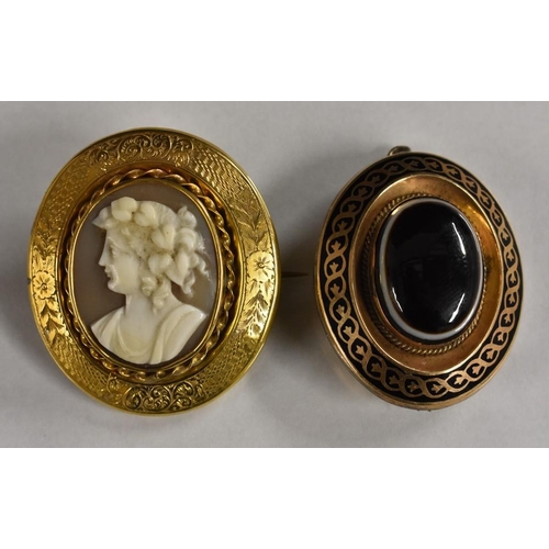 3236 - A Victorian carved shell cameo portrait mourning brooch, possibly Aphrodite, within a textured chase... 