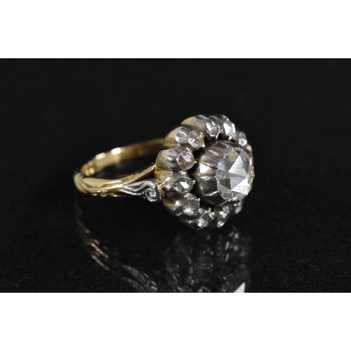 3240 - A 19th century old cut diamond cluster ring, central rose cut diamond surrounded by a band of twelve... 