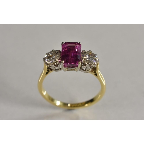 3246 - A sapphire and diamond trilogy ring, central octagonal cut pink sapphire, measuring 8.23mm x 5.46mm ... 