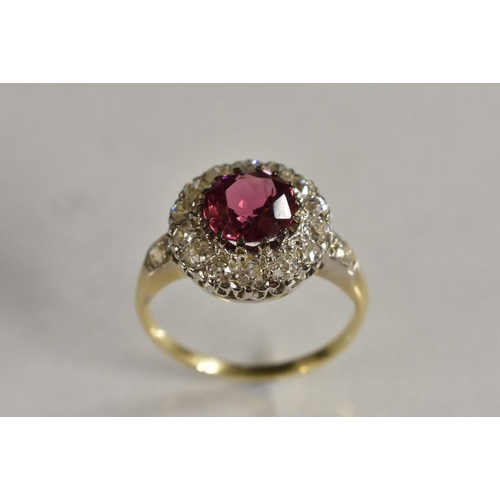 3250 - A spinel and diamond cluster ring, central rose pink spinel approx 1.77ct, surrounded by a band of f... 